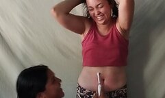 Tickle Paola's navel