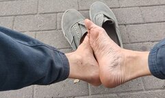 Staring at my long skinny feet sitting on a bench (avi)