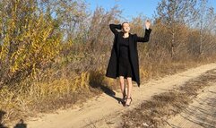 girl began to crush the can with her heels and did not notice how glue flowed out of it, which made her feet stick to the road