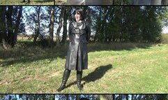 Handcuffed and ballgagged Mistress in a double-breasted leather coat