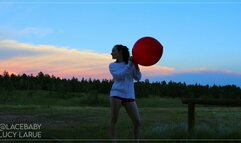 White Sweater Sunset and a Big Red Balloon
