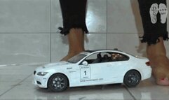 RC Car under naked feet and clear heels floor view