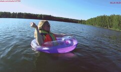 Alla swims in an inflatable ring on the lake!!!