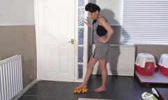 Katie Stepping On Oranges With Her Bare Feet (4K)