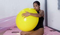 Sexy Stella Blows To pop A HUGE , Yellow Tuftex Balloon.