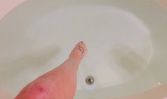 Carissa showing off her new body jewelry in the bathtub; an erotic show just for you!