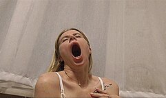 Sexy blonde yawns! MP4