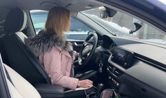 girl plays with her shoes in the car and presses all the buttons with her heels