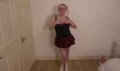 Naughty Schoolgirl in socks doing a strip tease