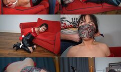 Black and red leather bound damsel hogtied and gagged (mp4)