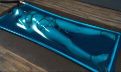 Rope bondage in blue latex bed with vibro and pear gag