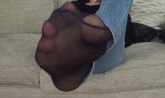 Black pantyhose and pretty toes