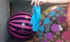 pop balloons gloves and balloons on big beachballs