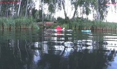 Alla swims in the lake and wears a red inflatable vest!!!