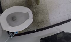 Using the disgusting public toilet