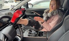 girl plays with high heels in the car and presses or pedals