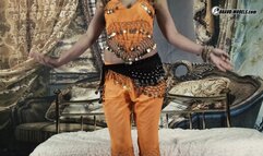 460 Izzy Delphine as orange jingling belly dancer