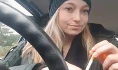 Car Smoking in Winter Jacket