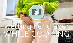 Wetting her diaper while cooking