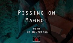 Pissing on Maggot