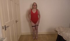 Dancing Striptease in red leotard and fishnet stockings