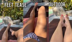 Feet tease outdoor while watching a movie