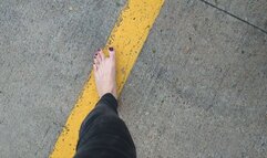 Fifi fast driving barefoot in skinny black jeans with jewelry