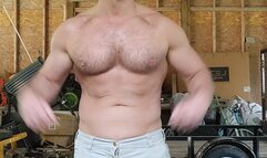 Muscle hunk pulls out his big dick