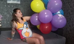 girl in swimsuit non pop balloons with helloo kitty