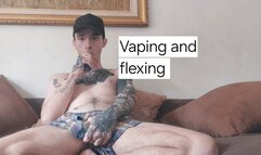 Skinny guy flexing and vaping