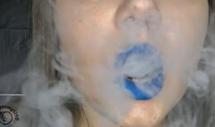 Vaping close-up with blue lipstick