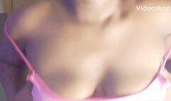 Igbo Omo Actress’ Jerks Up Boobies In Pink Singlet Up Close