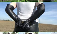 Handcuffed walk in leather leggings and opera gloves