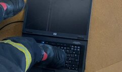 Firefighter crushing a Laptop 2