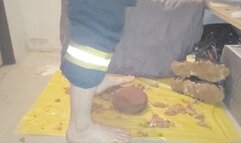 Firefighter stomping a Cake