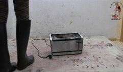 Toaster crushed under riding Boots