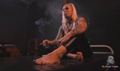 Smoking barefoot on pvc bed 4K MP4