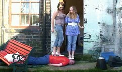 2 Girls Trampling Heels In The Garden Until His Face Goes Purple