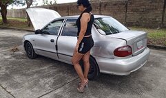 Repairing car in high heels and tights as well as pumping the pedal of the same (3)