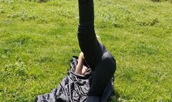 outdoor stretching while i wear nylon wind pants and bra