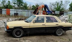 Nastya is practicing shaking an old Mercedes before making a custom video