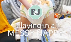 Playing in a messy nappy